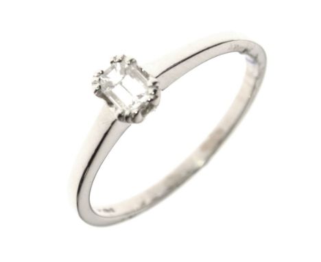 Platinum, solitaire diamond ring, the baguette cut stone approximately 4mm x 2.9mm, size N, 2.9g gross approx Condition: **Du