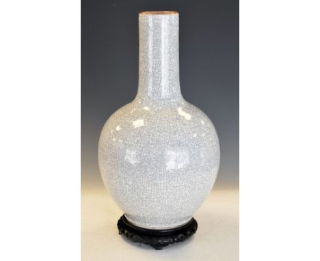 Modern Chinese crackle glaze vase raised on hardwood stand, unmarked, 46cm high overall Condition: Ceramics &amp; Glass/Orien