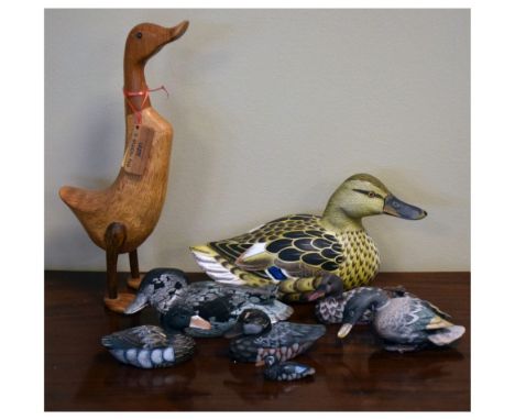 Collection of wooden ducks, late 20th Century, 36cm high and smaller Condition: Duck with losses to tail feathers, three with