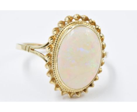 9ct Gold oval opal set ring, size R, 3.2gMarked 375