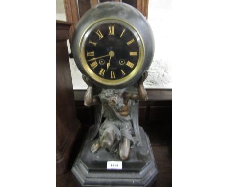 19th Century French figural two train mantel clock, in the form of Atlas supporting a globe on a moulded marble base, the cir