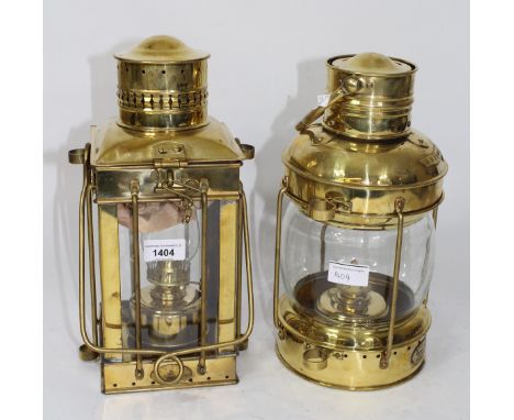 Brass mast head lamp by Davey &amp; Co, circa 1980, together with a similar anchor lamp, 33cm high each
