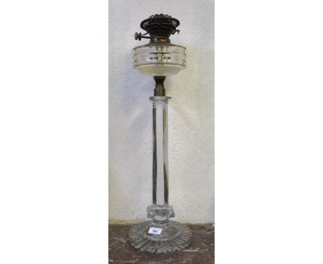 Large 19th Century glass oil lamp, with a hexagonal stem on a circular base, 67cm highChip to foot, which is an old chip and 