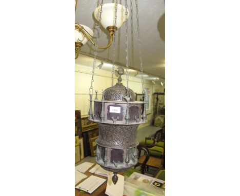 20th Century Indian patinated metal hanging lantern, with glass shades and hanging chain, 48cm high