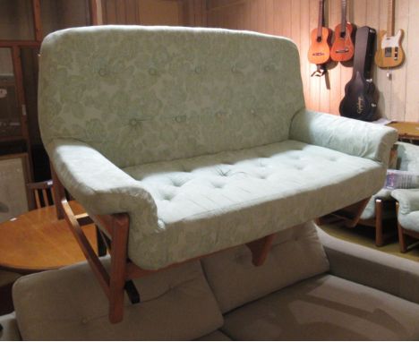 20th Century teak framed two seat sofa, with pair of matching armchairs, with floral damask upholsteryThere are some stains/m