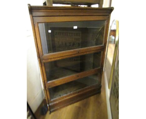 Globe Wernicke type oak three section bookcase, 87cm wide