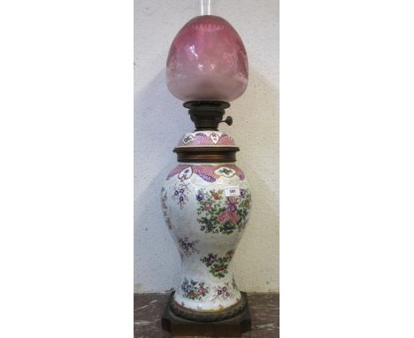 Late 19th Century Samson porcelain and gilt brass mounted oil lamp modelled as a Chinese export vase, the etched cranberry ti