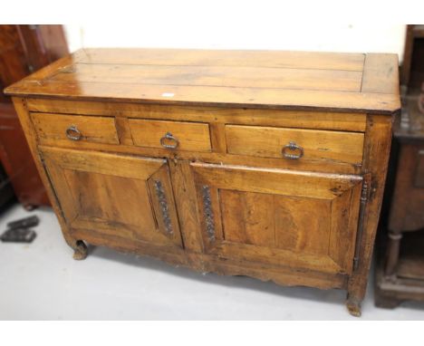 18th Century French cherrywood buffet, with three drawers above two doors, raised on shaped feet, 138 x 53 x 88cm highthe uni