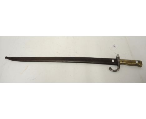19th Century French Bayonet, the blade engraved 'Chassepot ' with scabbard, dated 1870