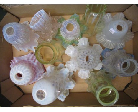 Quantity of various Vaseline glass lamp shades including three pairsSeventeen in total. Various chips to rims and foots, as s