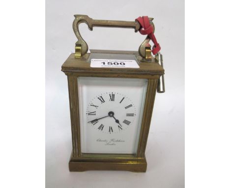 Charles Frodsham, small brass cased carriage clock, the enamel dial with Roman numerals and single train movement