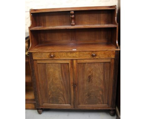 George IV mahogany chiffonier, the open shelf superstructure above a single drawer, and a pair of panelled doors flanked by r