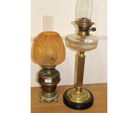 19th Century brass column oil lamp with cut glass well and another brass oil lamp with coloured shadeDoes have some small chi