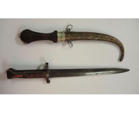 World War I bayonet, together with a dagger with wooden handle and brass sheath