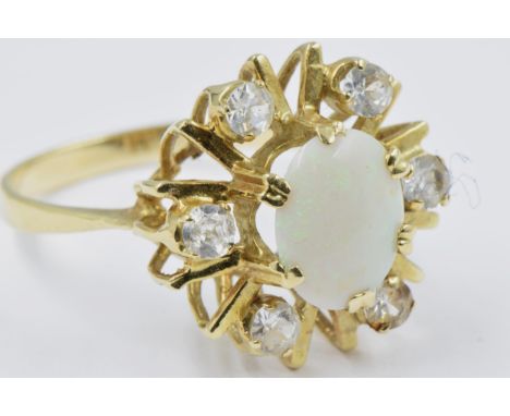 14ct Yellow gold ring set oval opal and six cubic zirconia, size R, 5.2g
