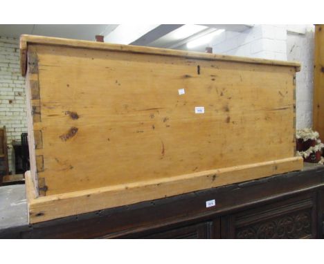 19th Century stripped polished pine trunk, having hinged cover, on plinth base, 110cm wide x 47cm deep x 48cm high