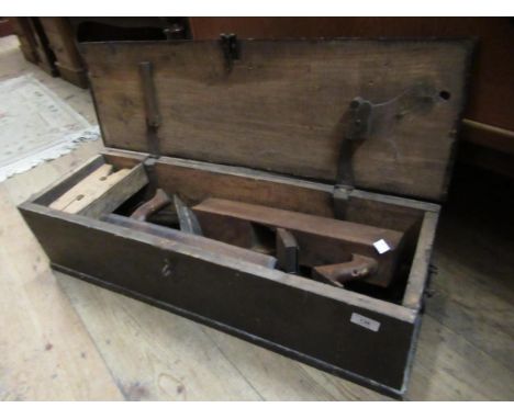 Pine tool box containing two woodworking planes and various engineers tools