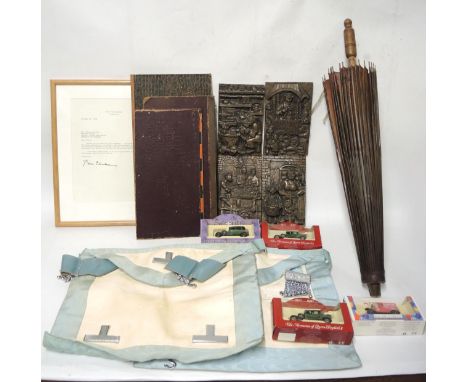 Box containing a quantity of various items including board games, chess, cards, Masonic aprons etc.