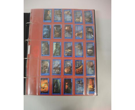 One large album of Bassett's packages and cards, including Lord of the Rings etc.