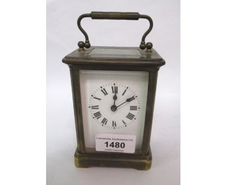 Small 20th Century brass cased carriage clock, the enamel dial with Roman numerals and single train movement