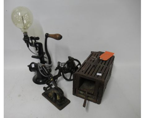 Vintage apple peeler, letter press, rat trap and a vintage mincer adapted for use as a lamp