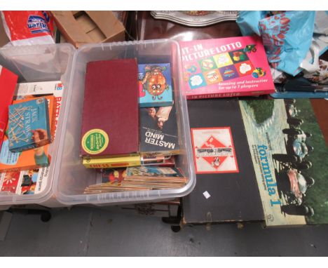 Two boxes of various board games including Formula I and Monopoly