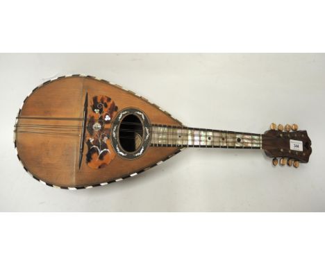 19th Century Italian mandolin with a mother of pearl inlaid fingerboard, labelled Petro Ruffini