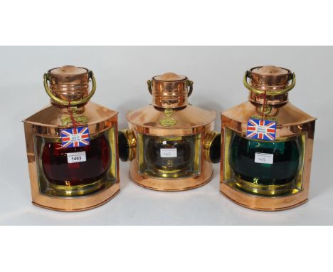 Pair of copper and brass port and starboard lamps by Davey &amp; Co, circa 1980, 30cm high, together with a matching mast hea