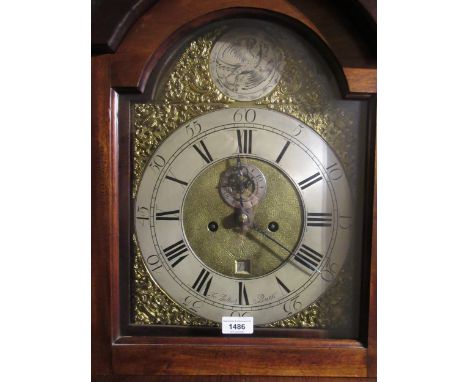 19th Century mahogany longcase clock, the arched brass dial with silvered chapter ring, having Roman numerals and subsidiary 