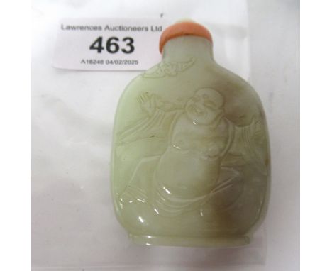 Chinese pale green and russet jade snuff bottle, relief carved with a bird in foliage, with a coral and split pearl stopper, 