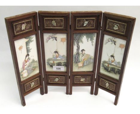 Modern Chinese miniature wooden framed four fold screen having porcelain panels, decorated with figures in gardensCondition a