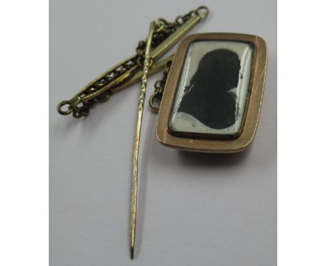 John Miers, miniature silhouette on card, portrait of a gentleman in gold mount on a pinchbeck chain, signed, 17 x 9mm