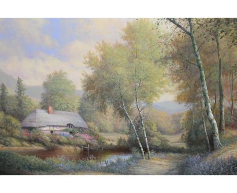 Paul R. Morgan, oil on canvas board, thatched cottage before a pond in a landscape, signed, 40 x 60cm, in a swept gilt frame