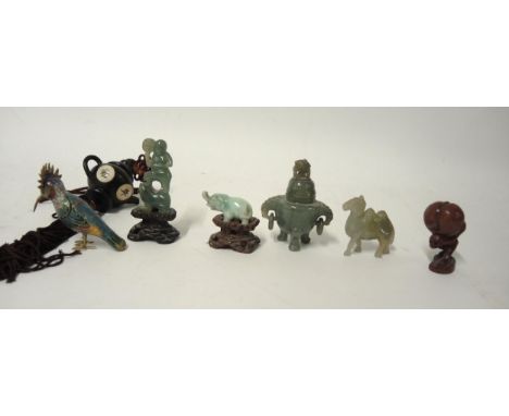 Small quantity of oriental green stone carved figures including a censer, cloisonne bird etc.Elephant has had trunk glued bac