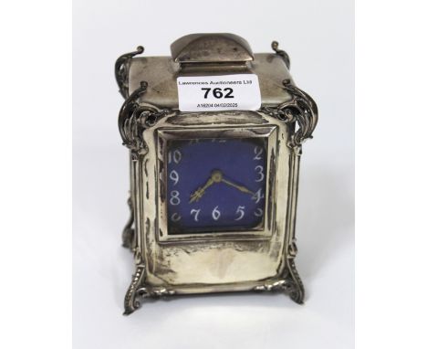 Early 20th Century silver cased dressing table clock with enamel dial and keywind movement, 13cm high (dial and movement loos