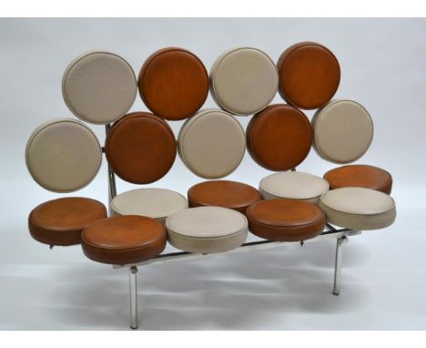 1970'S Marshmallow sofa in the style of George Nelson, having beige and brown leather upholstered seat pads on chrome finishe