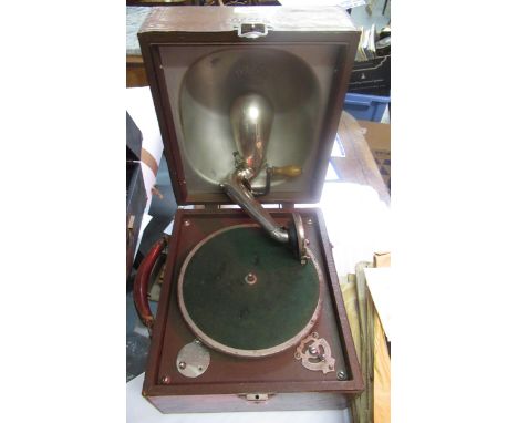 Decca leather cased portable wind-up gramophone, together with another in a black rexine case, and a small quantity of 78 spe