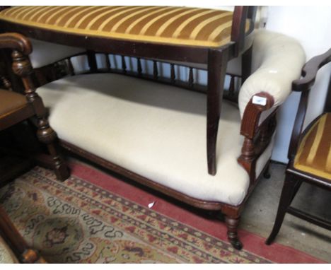 Edwardian walnut drawing room sofa, with beige linen upholstery, on turned supports with castersGenerally in good condition, 