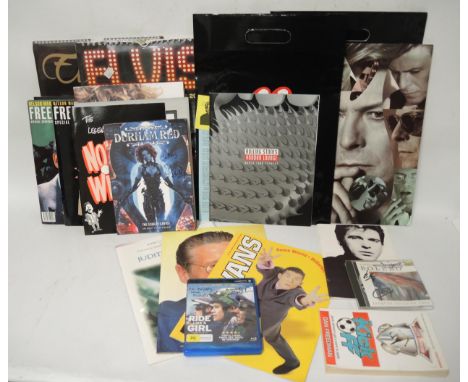 Quantity of various signed memorabilia, programmes etc. including Norman Wisdom, Lee Evans, together with a David Bowie 1990 