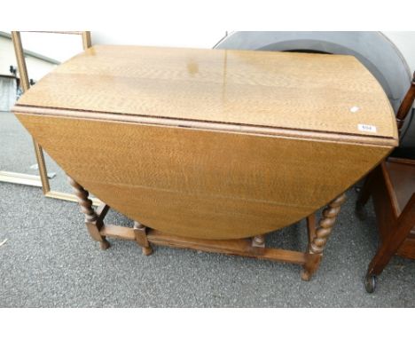 Light Oak Drop Leaf Table: length 106cm, open width 148cm &amp; height 74cm 