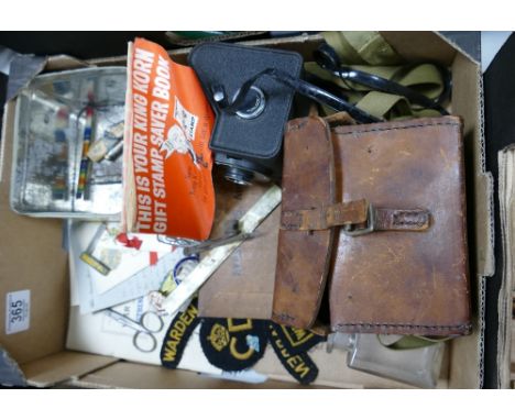 A mixed collection of items to include: Warden badges, ensign camera, medal ribbons, badges etc 
