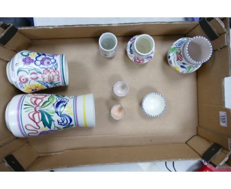 A collection of Floral Decorated Poole Pottery Vases: height of tallest 23cm 