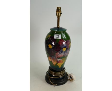 Moorcroft Clematis lamp base: on green. Hieght including fitting 48cm 
