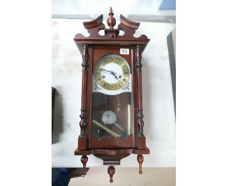 Mahogany wall clock: with pendulm and key 