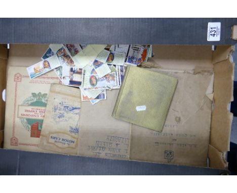 A collection of 1930's Cigarette Card Books including: Army Uniforms, Motorcars, Commemorative items &amp; Golden Jubilee Pic