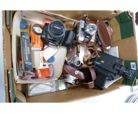 A collection of vintage camera equipment to include: Minolta Dynax 500si, Braun Paxette, voigtlander vito clr, AGFA Movexoom 