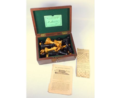 STAUNTON STYLE MATCHED CHESS SET WITH THIRTY-TWO EBONY AND BOXWOOD PIECES, THE BOXWOOD KING, SIGNED, HEIGHT OF KING, 8.5 CM, 