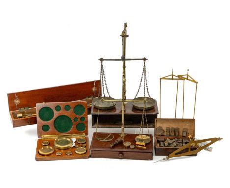 COLLECTION OF ANTIQUE BRASS INSTRUMENTS including, two sets of scales, box of apothecary weights, box of alphabet printers bl