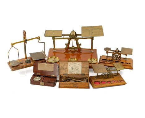 COLLECTION OF ANTIQUE BRASS SCALES including, postal/letter scales, one with associated weights, larger parcel scales, diamon