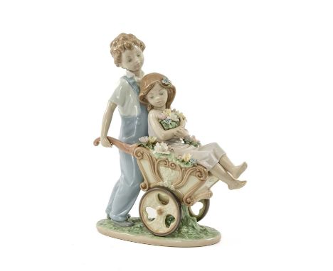 LLADRO PORCELAIN FIGURINE, The Prettiest of All, 6850, children with wheelbarrow, 25cms (h)Provenance: private collection Car